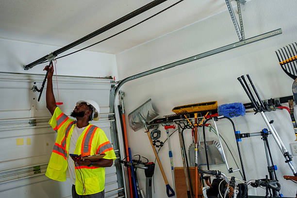 Professional Garage Door Panel Replacement technician working in Wellston, OH